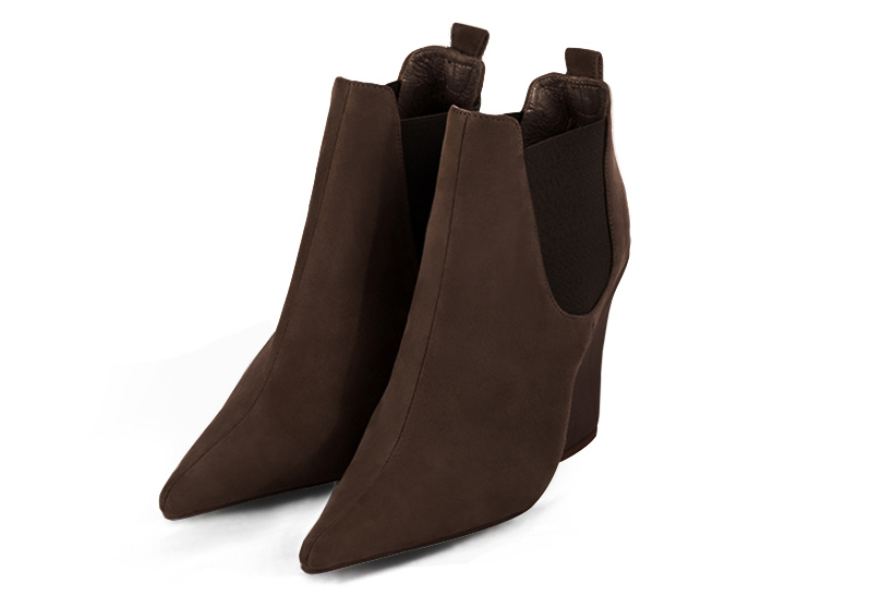 Dark brown women's ankle boots, with elastics. Pointed toe. Very high wedge heels. Front view - Florence KOOIJMAN